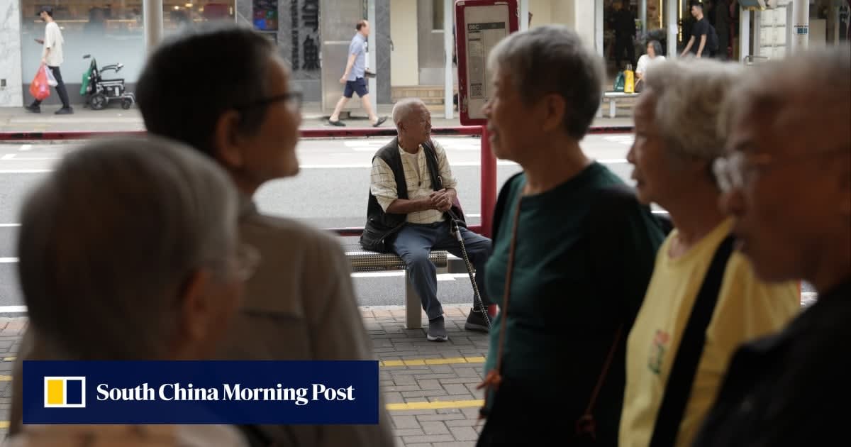 Senior caregiver assisting elderly person with dementia in Hong Kong home setting