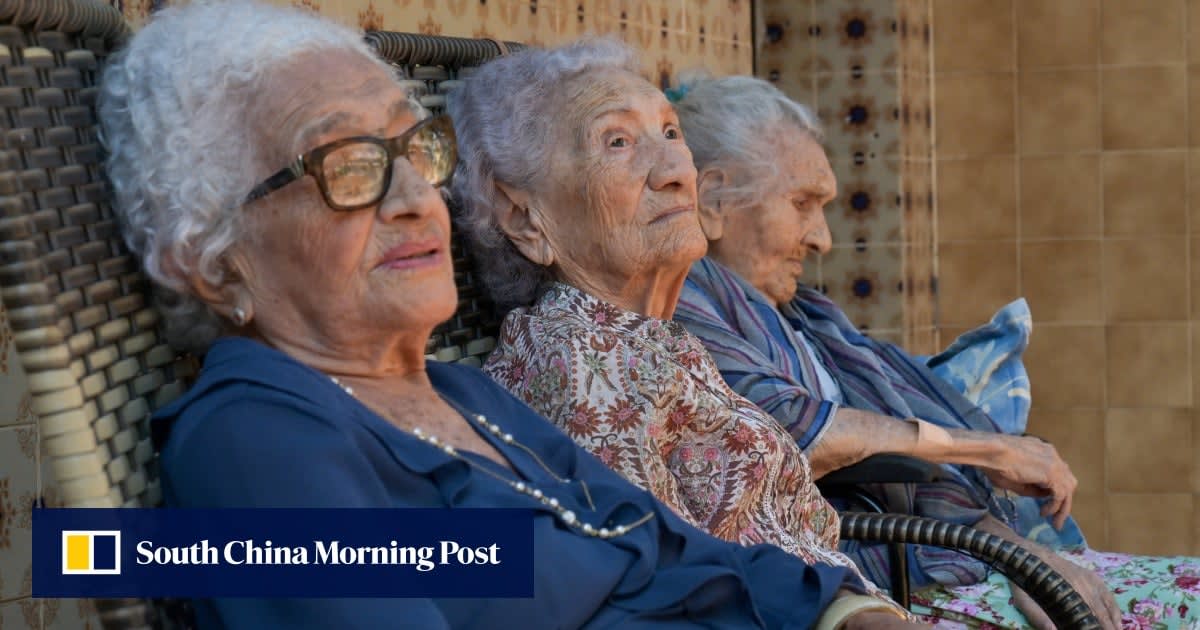 Three elderly Brazilian sisters sitting together, world's oldest living sibling trio at combined age 316