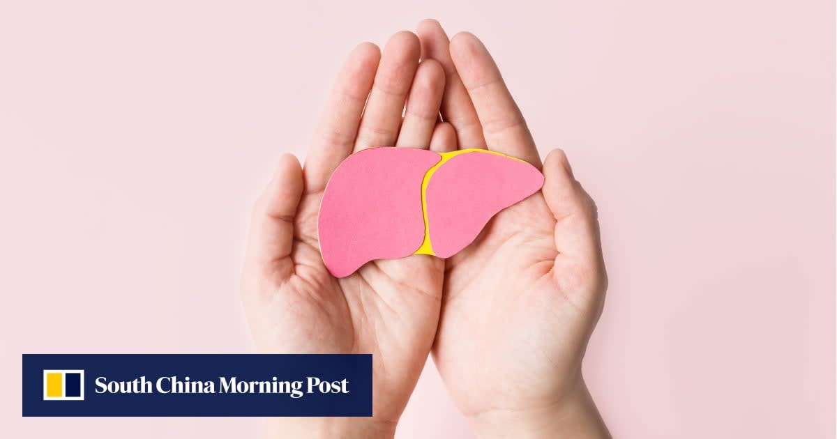Asian woman smiling confidently after successful early liver cancer treatment in Hong Kong hospital