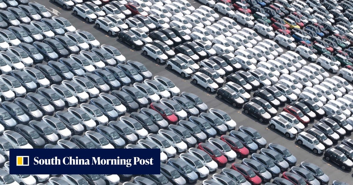 Ford F-150 pickup trucks lined up at dealership lot showing current US automotive market
