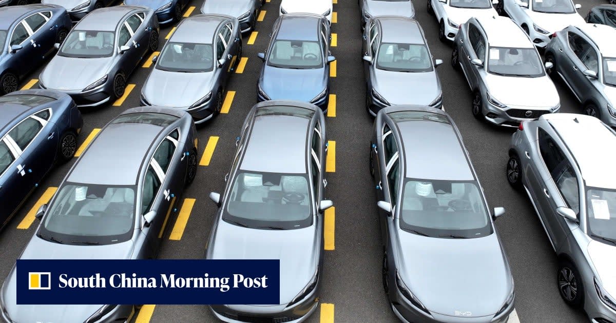 Electric vehicle charging at modern station in African city with solar panels overhead