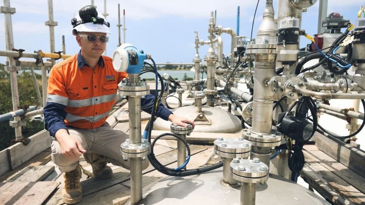 Industrial carbon capture facility with pipes and equipment converting emissions into mineral materials