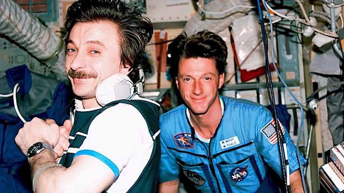 ** Astronaut Michael Foale floating inside Russia's Mir space station during his 1997 mission