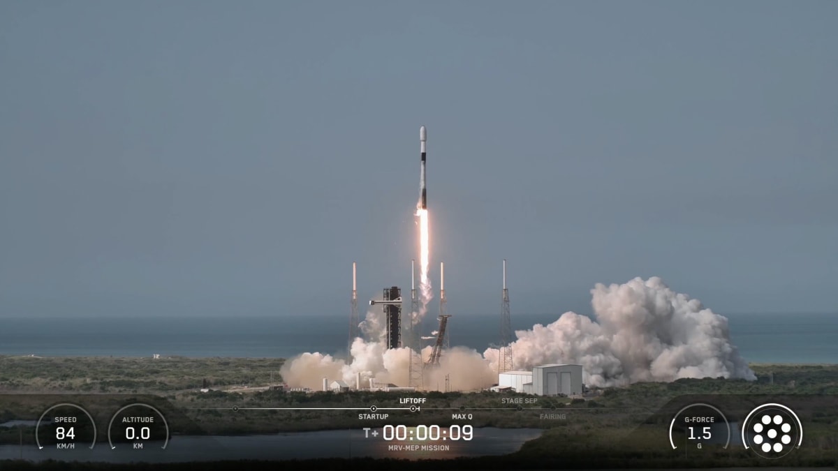 Robotic spacecraft with extended mechanical arms approaching satellite in Earth orbit for repair mission