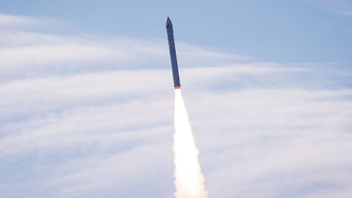 Space One's white Kairos rocket launching from coastal Spaceport Kii in Japan