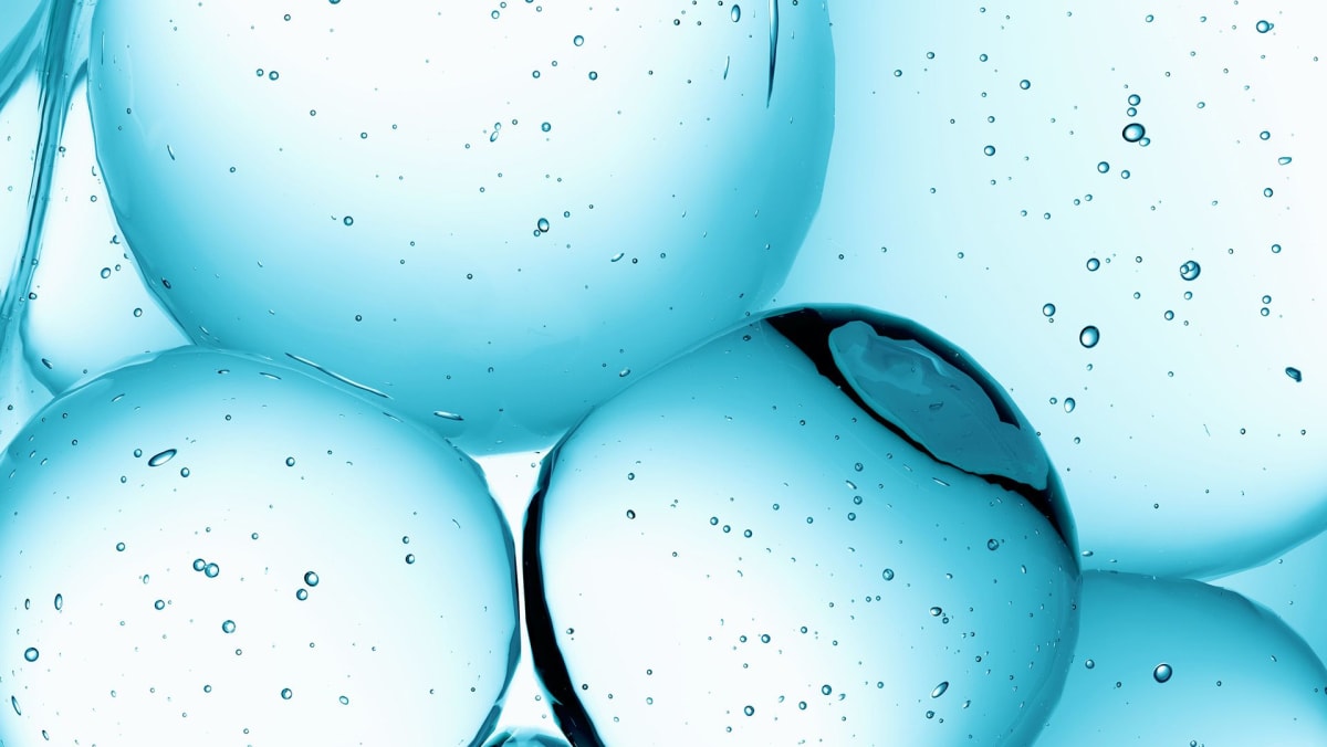 Close-up of water droplets on battery components representing new non-toxic aqueous battery technology