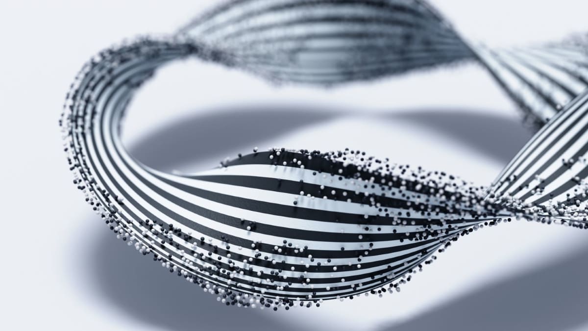 Illustration of a twisted molecular ring structure showing half-Möbius topology with carbon atoms