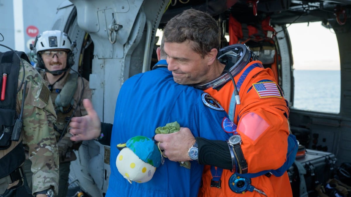 Astronaut Brings Moon Mascot Home to Honor Late Wife