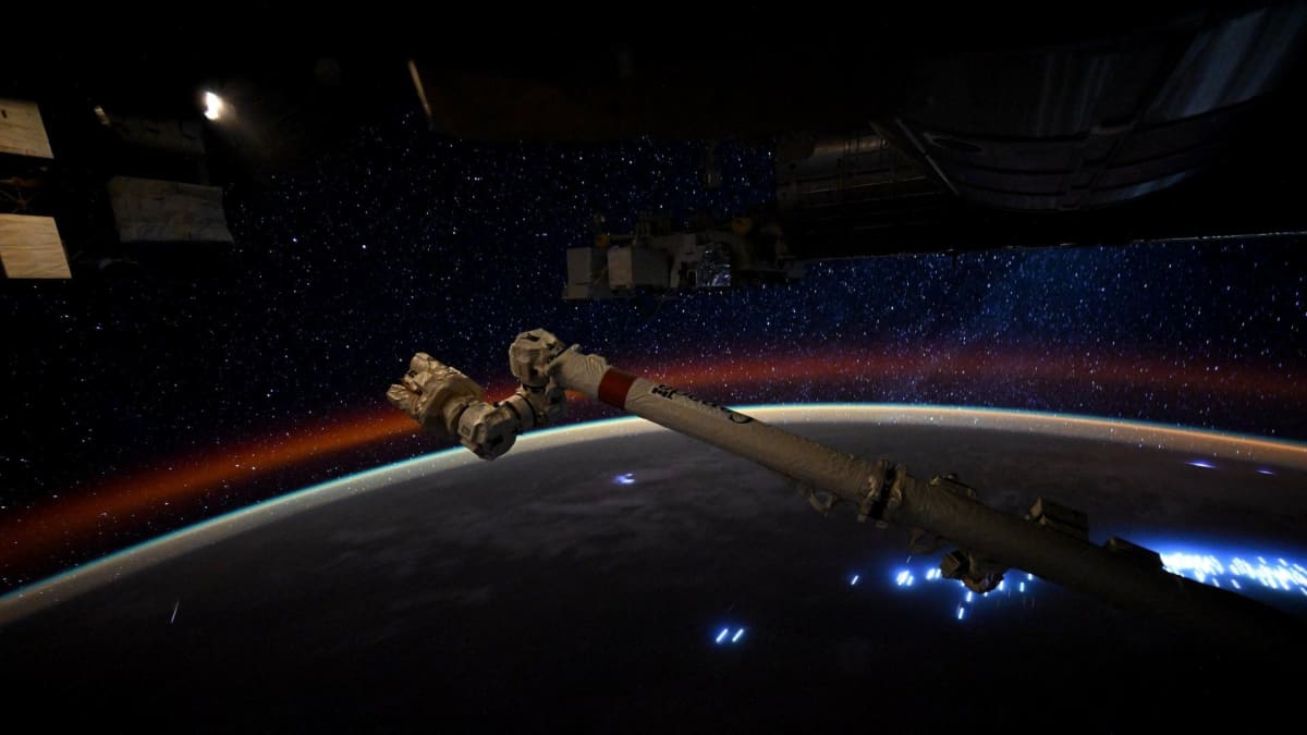 Lyrid meteor streaking through Earth's atmosphere photographed from International Space Station above planet