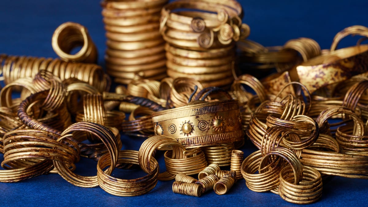 Golden spiral rings and ornate brooch from 3,300-year-old German treasure hoard display