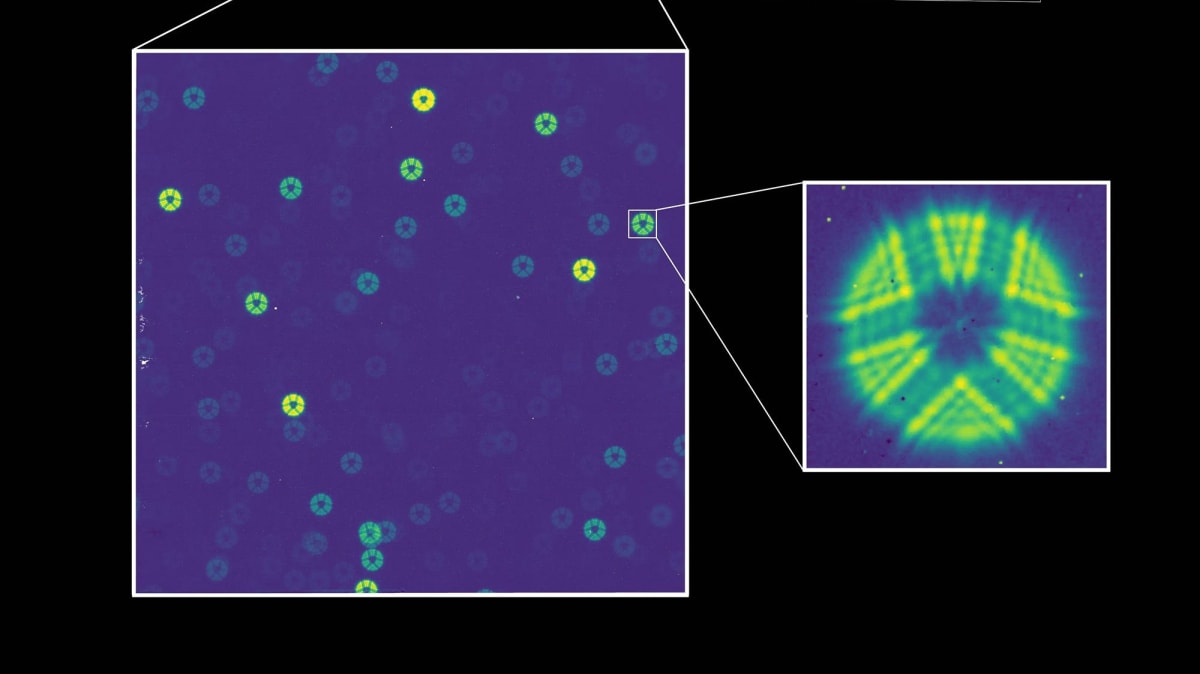 ** Roman Space Telescope's first test image showing hundreds of stars as green rings of light