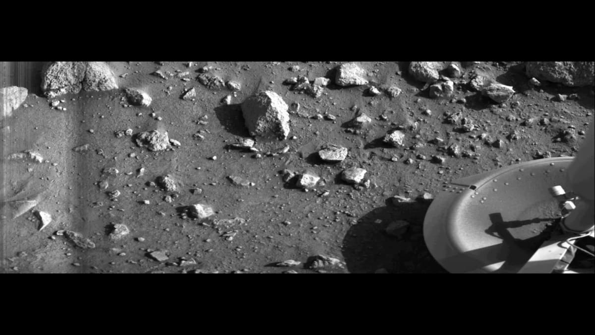 ** First photograph taken on Mars surface by Viking 1 lander showing rocks and dusty terrain
