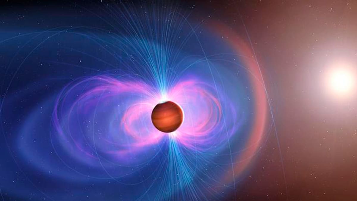 Artistic rendering of hot Jupiter exoplanet with glowing magnetic field near parent star