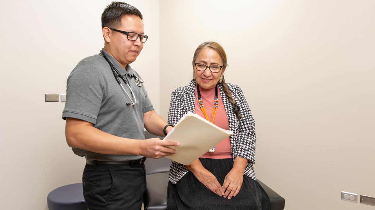 Healthcare workers providing medical services at community health center serving underserved population