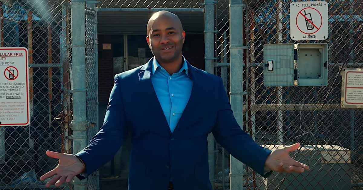 Kerwin Pittman standing in front of the former Wayne County Correctional Center building