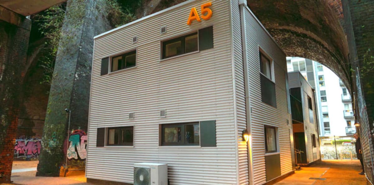 Manchester Opens 40-Home Village Under Railway Arches - Image 2