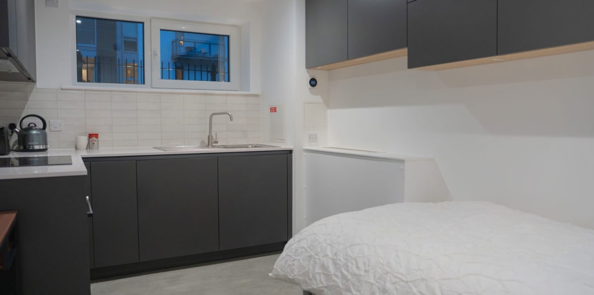 Manchester Opens 40-Home Village Under Railway Arches - Image 3