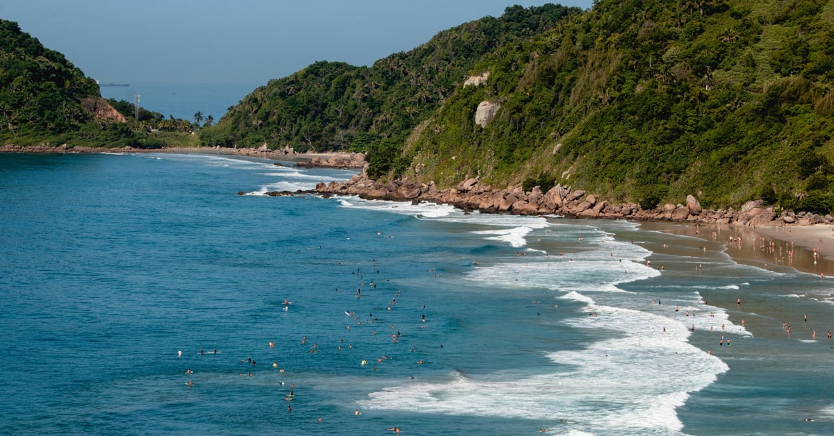 Waves crashing at the mouth of Brazil's Doce River where water meets Atlantic Ocean
