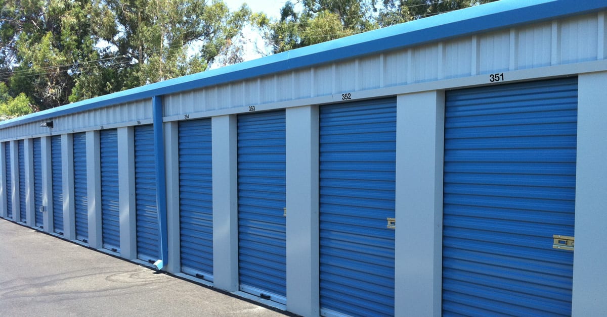 Shula Kitkowska smiling in car filled with donated household items for people in need