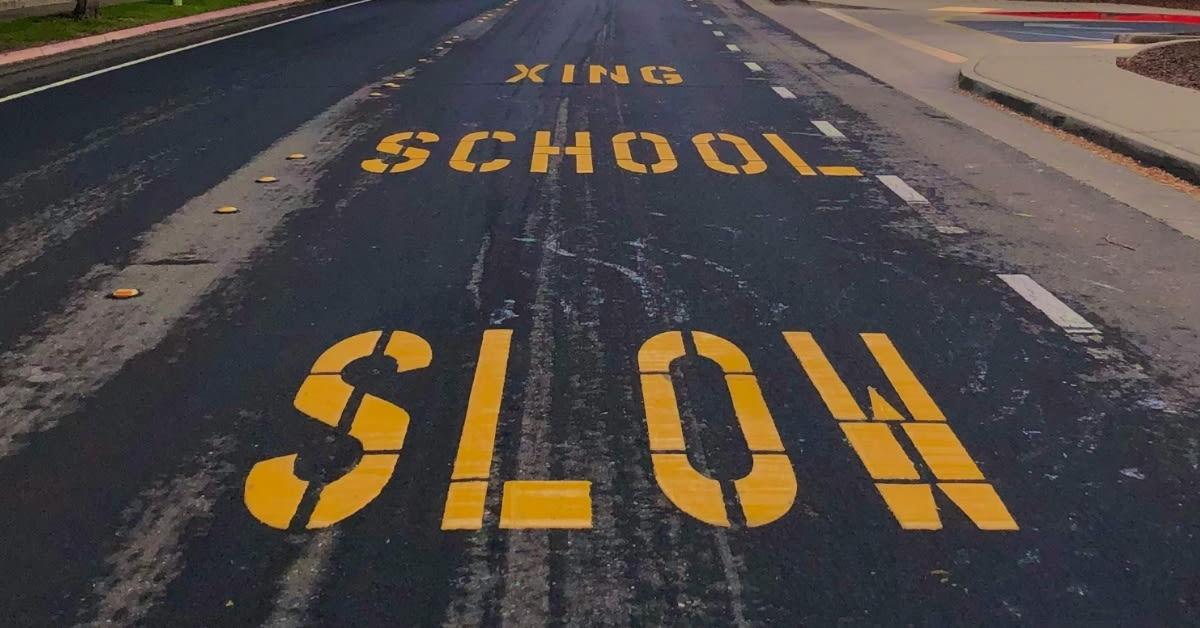 Modern car dashboard displaying digital speedometer and GPS navigation system with safety technology indicators