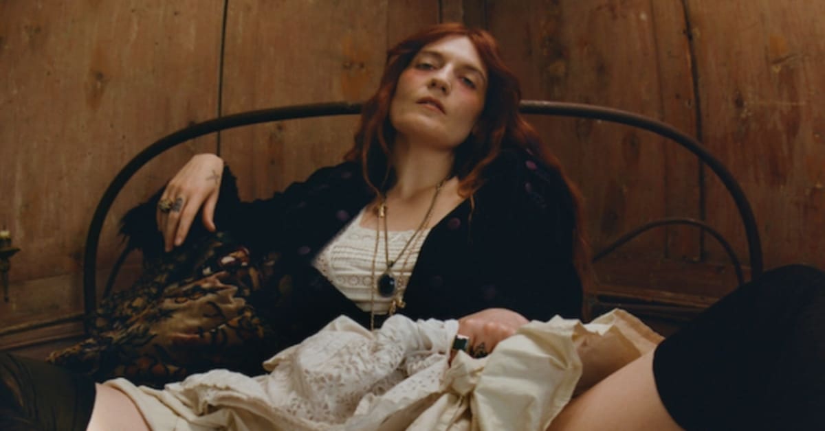 Florence Welch performing on stage during her Everybody Scream concert tour