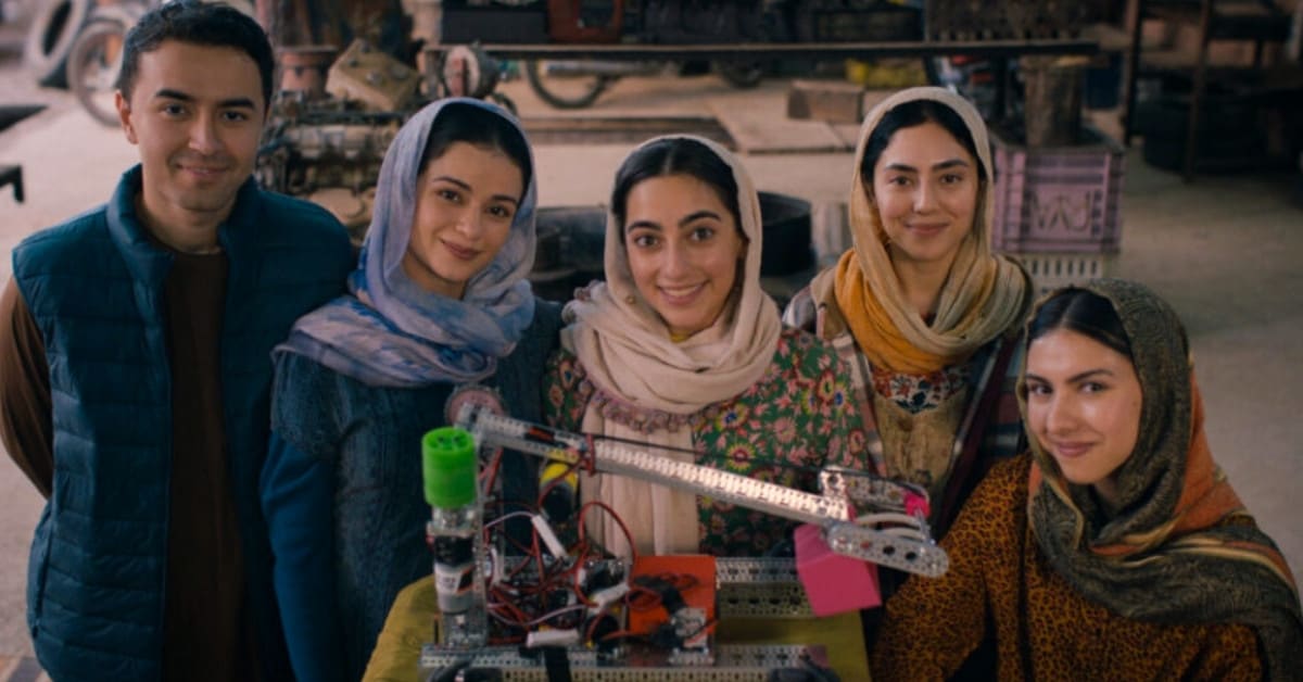 Roya Mahboob working with students on technology and robotics education programs