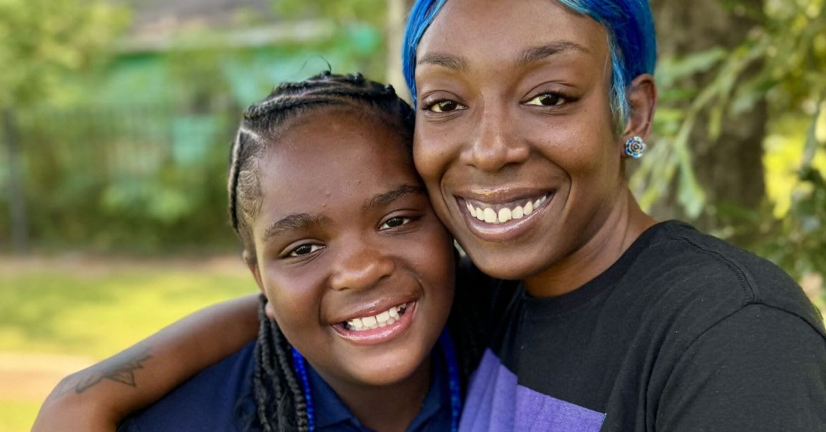 Black mothers and children smiling together, supported by Magnolia Mother's Trust guaranteed income program