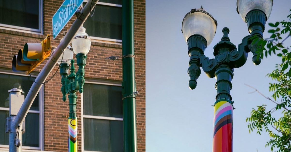 Rainbow Pride flag cylinders wrapped around street lights in downtown El Paso, Texas