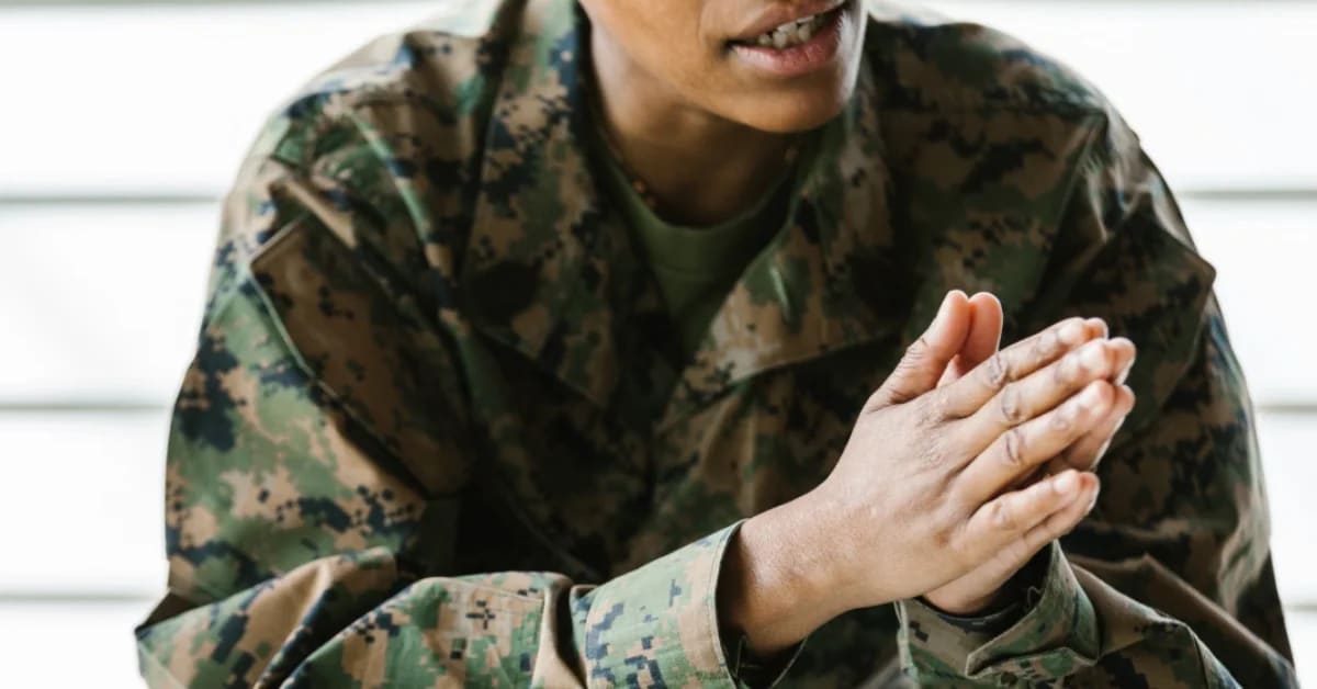 Sergeant Cassandra Taylor in military uniform smiling, founder of Top Flight Defense nonprofit organization