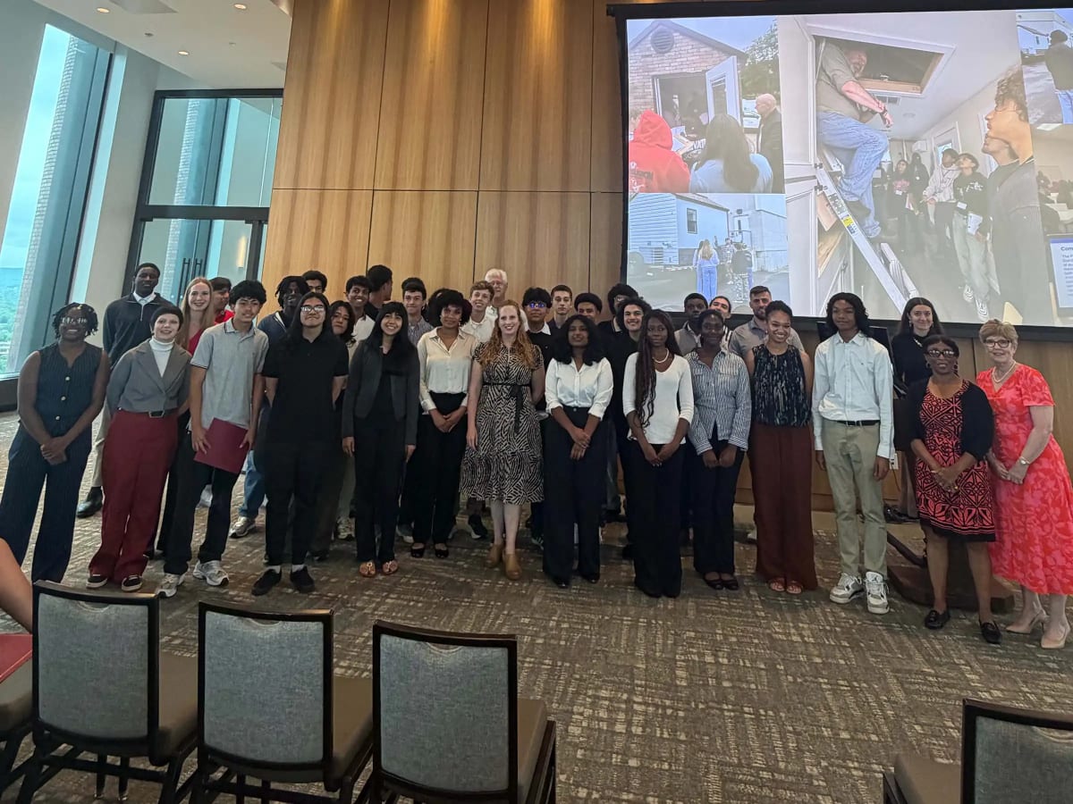 Connecticut high school students in safety gear receiving hands-on green energy job training