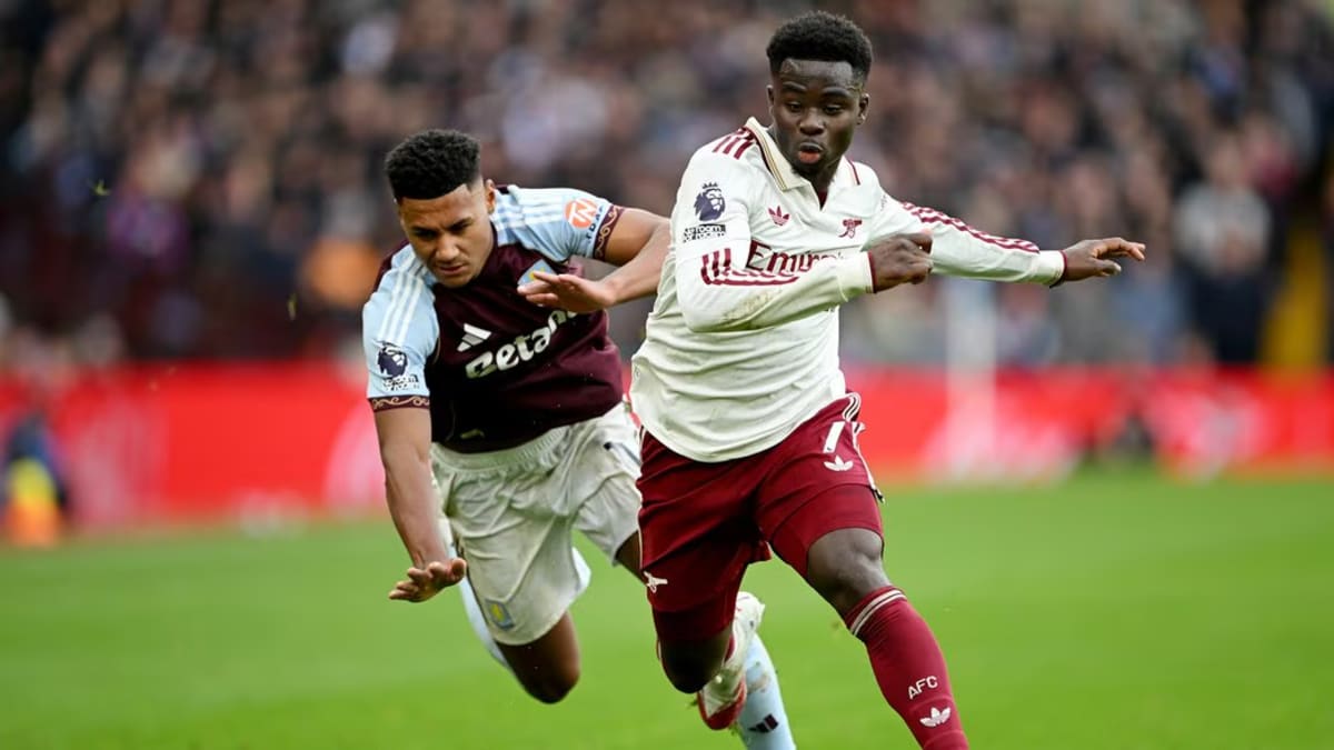 Arsenal forward Bukayo Saka celebrating in England jersey during international football match