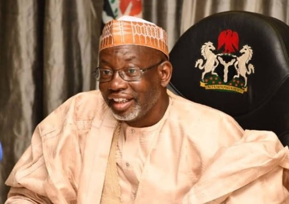 Nigerian government officials inspecting food distribution at community feeding center during Ramadan program