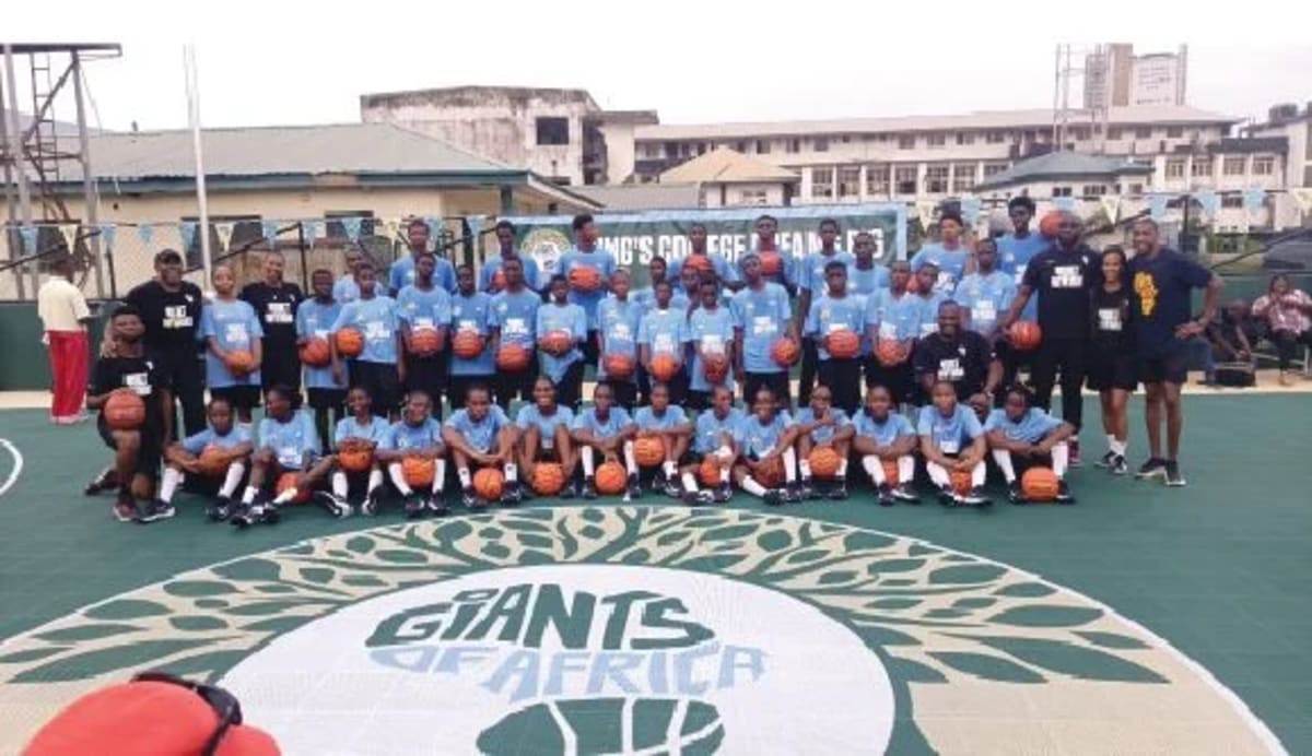 Students and community members gathered at new outdoor basketball court in Lagos school