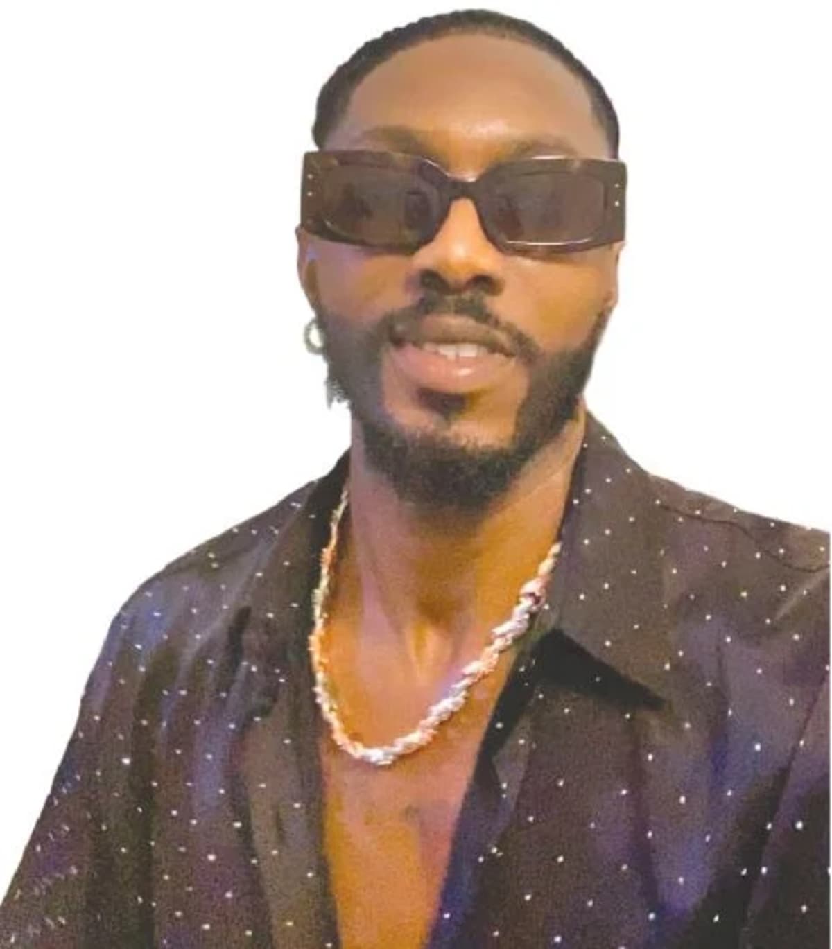 Nigerian gospel singer Samwell smiling, known for loyalty to Super Eagles football team