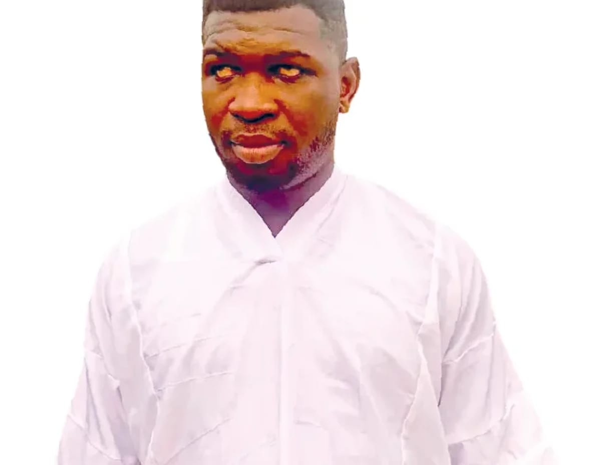 Olatunji Ajibola, blind Nigerian keyboardist and music producer, performing at his keyboard