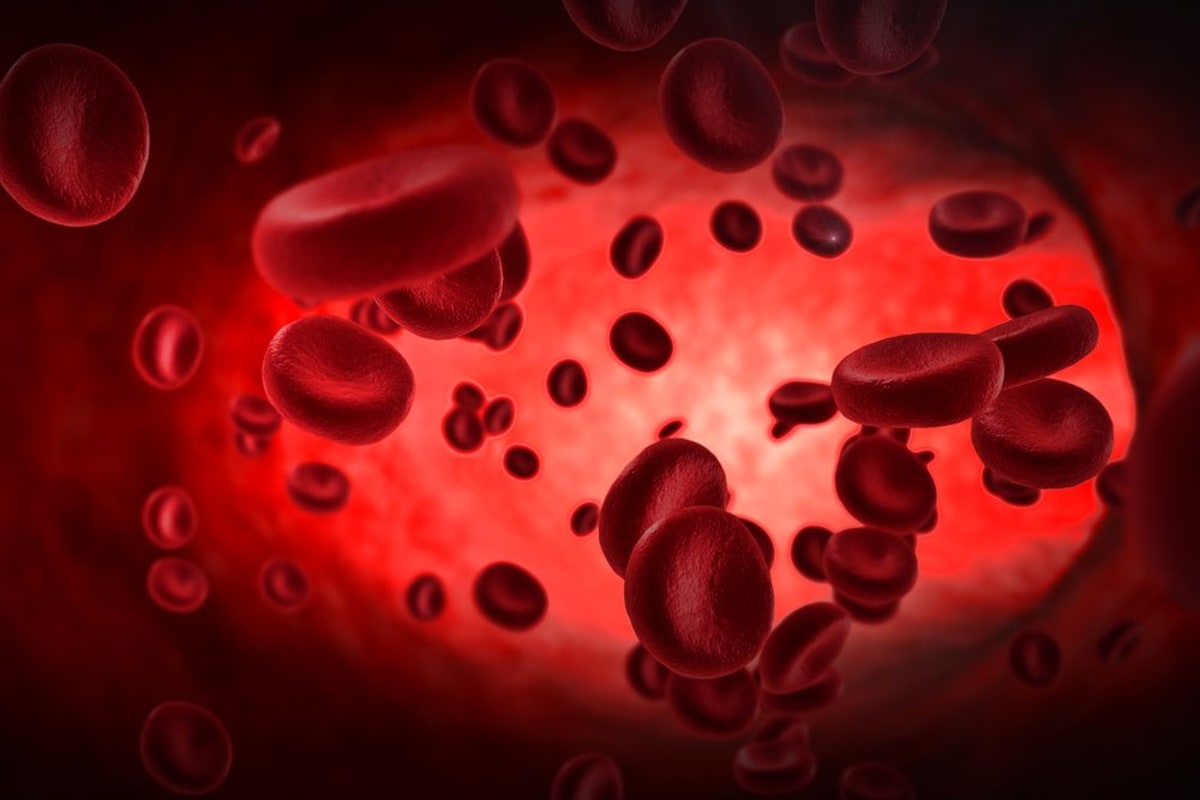 Healthcare worker providing medical care to child with sickle cell disease in Nigeria