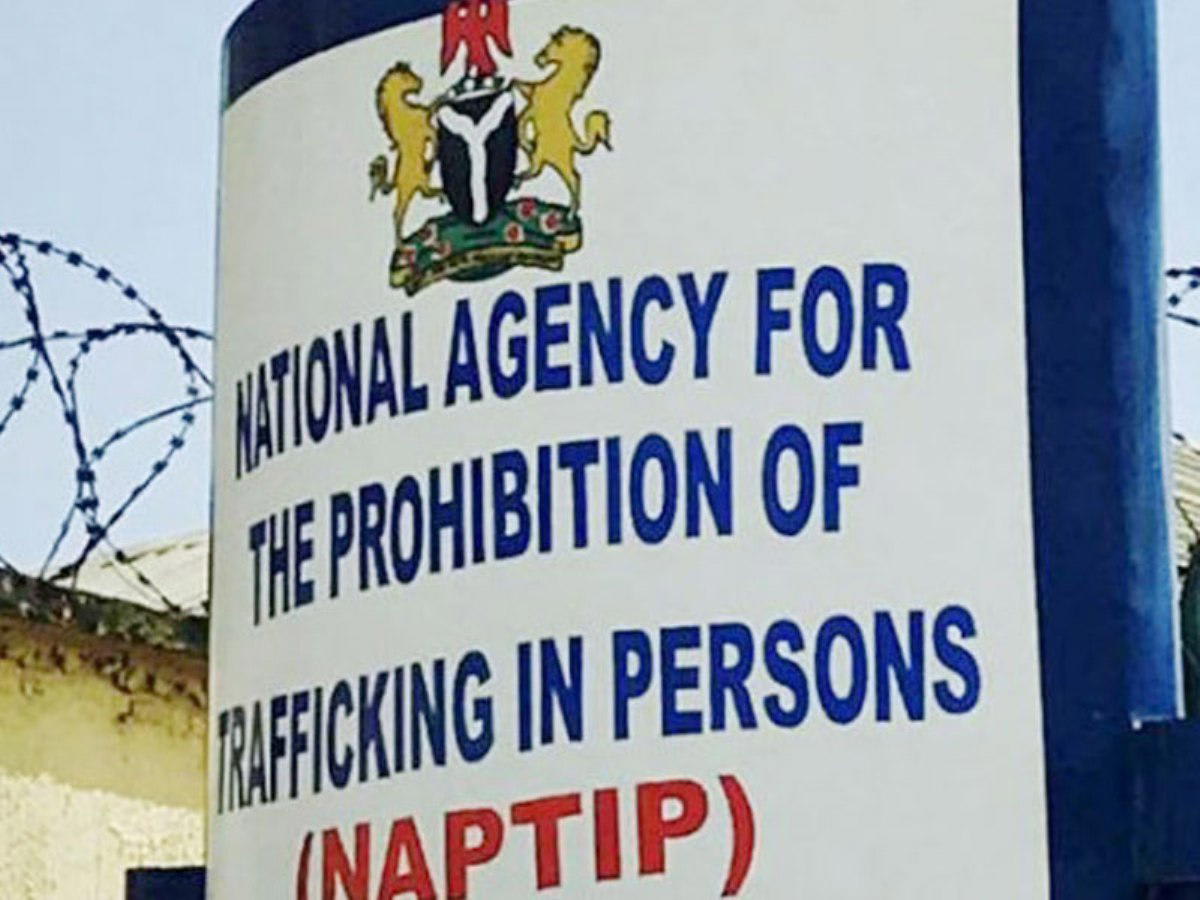 Nigerian law enforcement officers working together at security operations center protecting trafficking victims