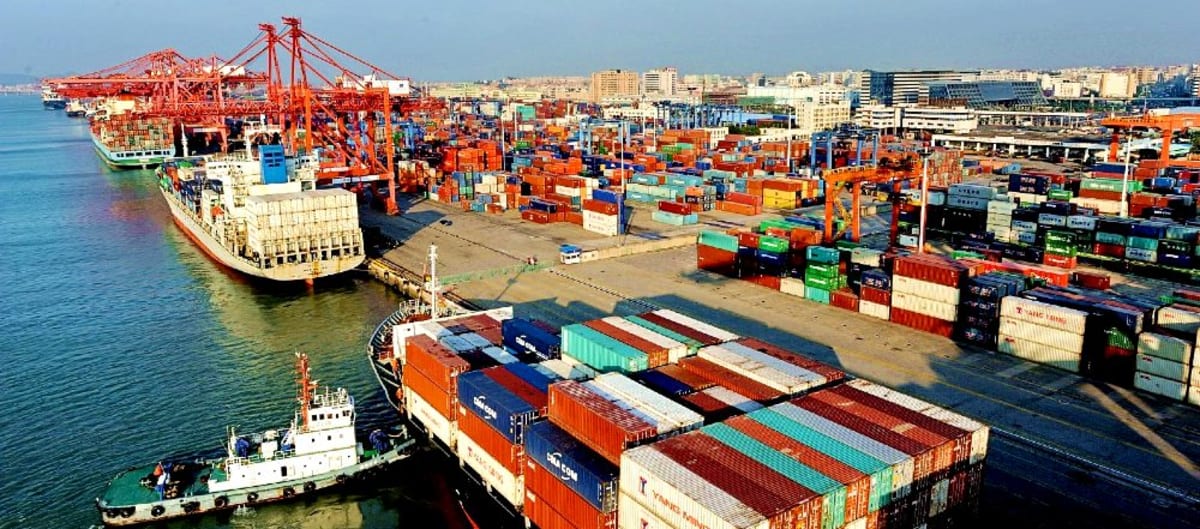 Cargo ships and containers at busy Nigerian port terminal facilitating international trade
