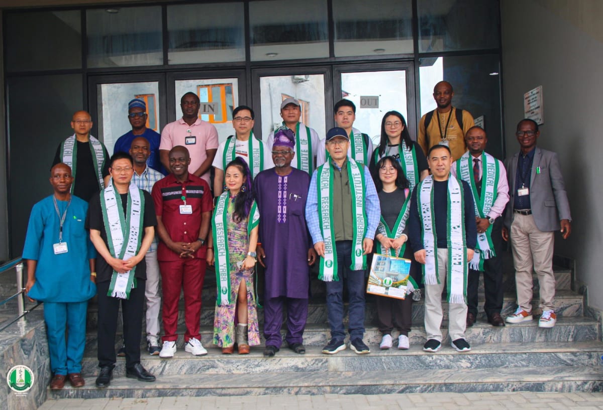 Scientists working in medical research laboratory examining biological samples in Nigeria biobank facility