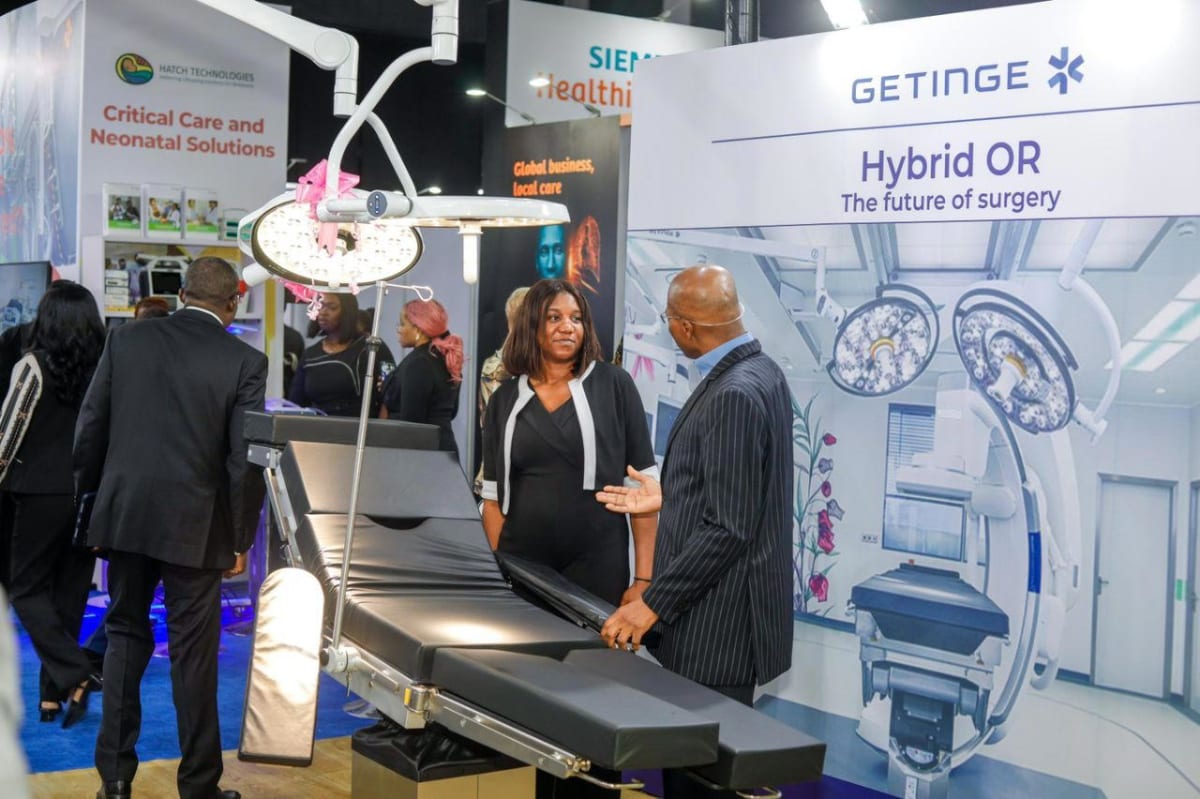 Healthcare professionals and exhibitors networking at World Health Expo conference in Lagos, Nigeria