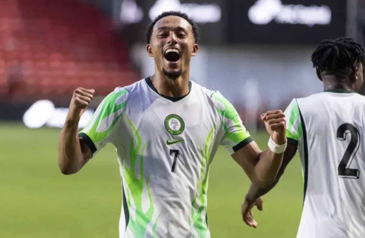 Nigerian footballer Femi Azeez celebrates after scoring on his national team debut against Zimbabwe
