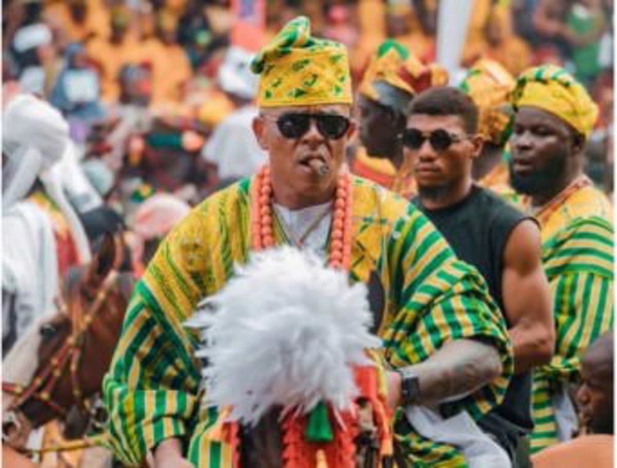 Richly dressed participants in traditional Yoruba attire at Nigeria's colorful Ojude Oba Festival celebration