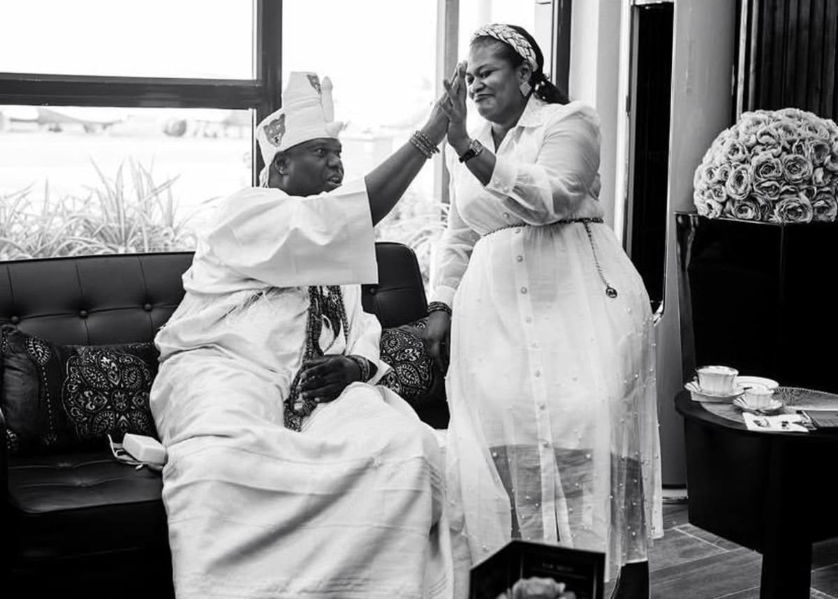 Traditional Nigerian ruler the Ooni of Ife in ceremonial royal attire smiling