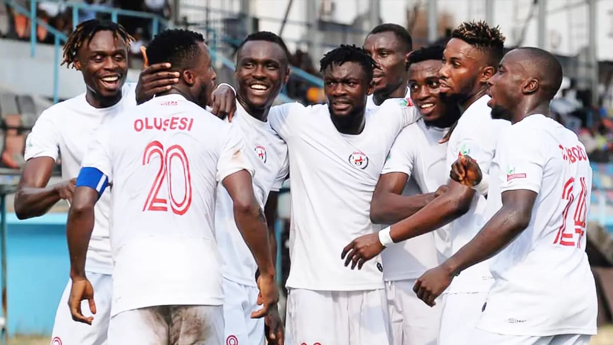 Enugu Rangers football players celebrating their ninth Nigerian league championship title victory