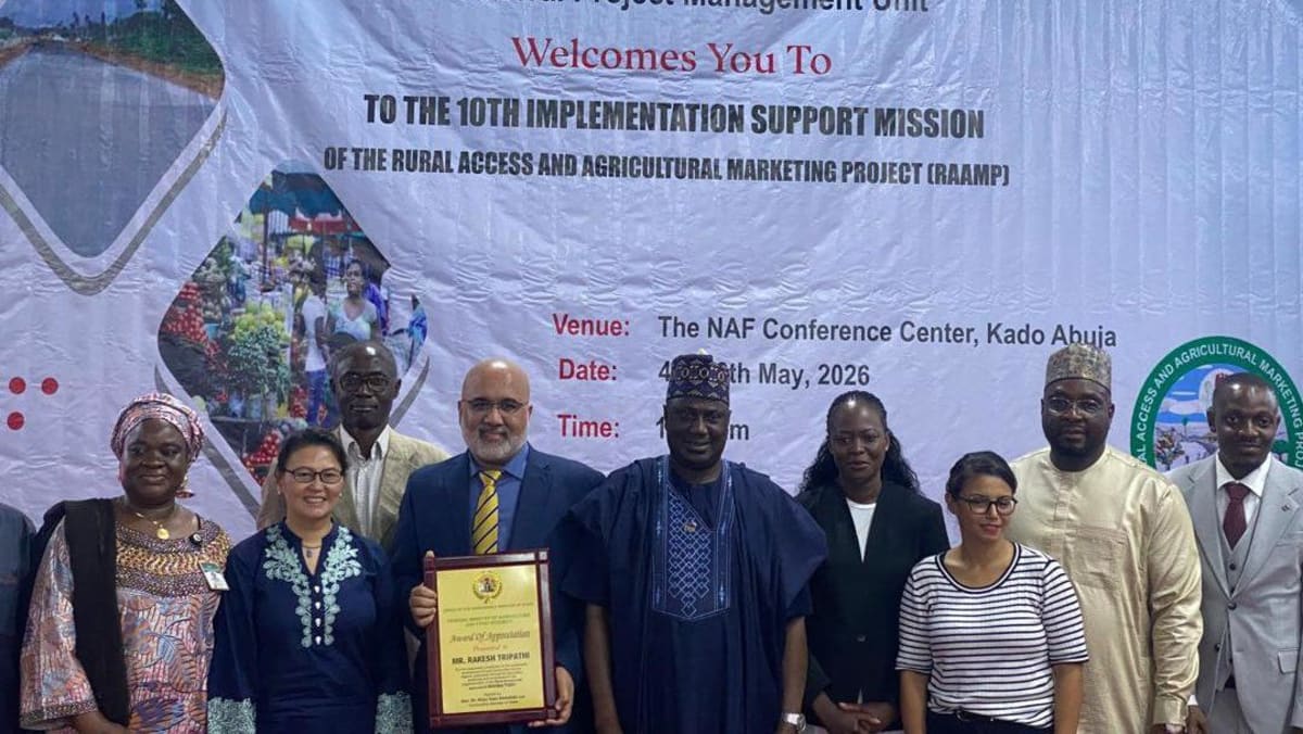 Rural Nigerian road construction connecting farming communities to markets and essential services