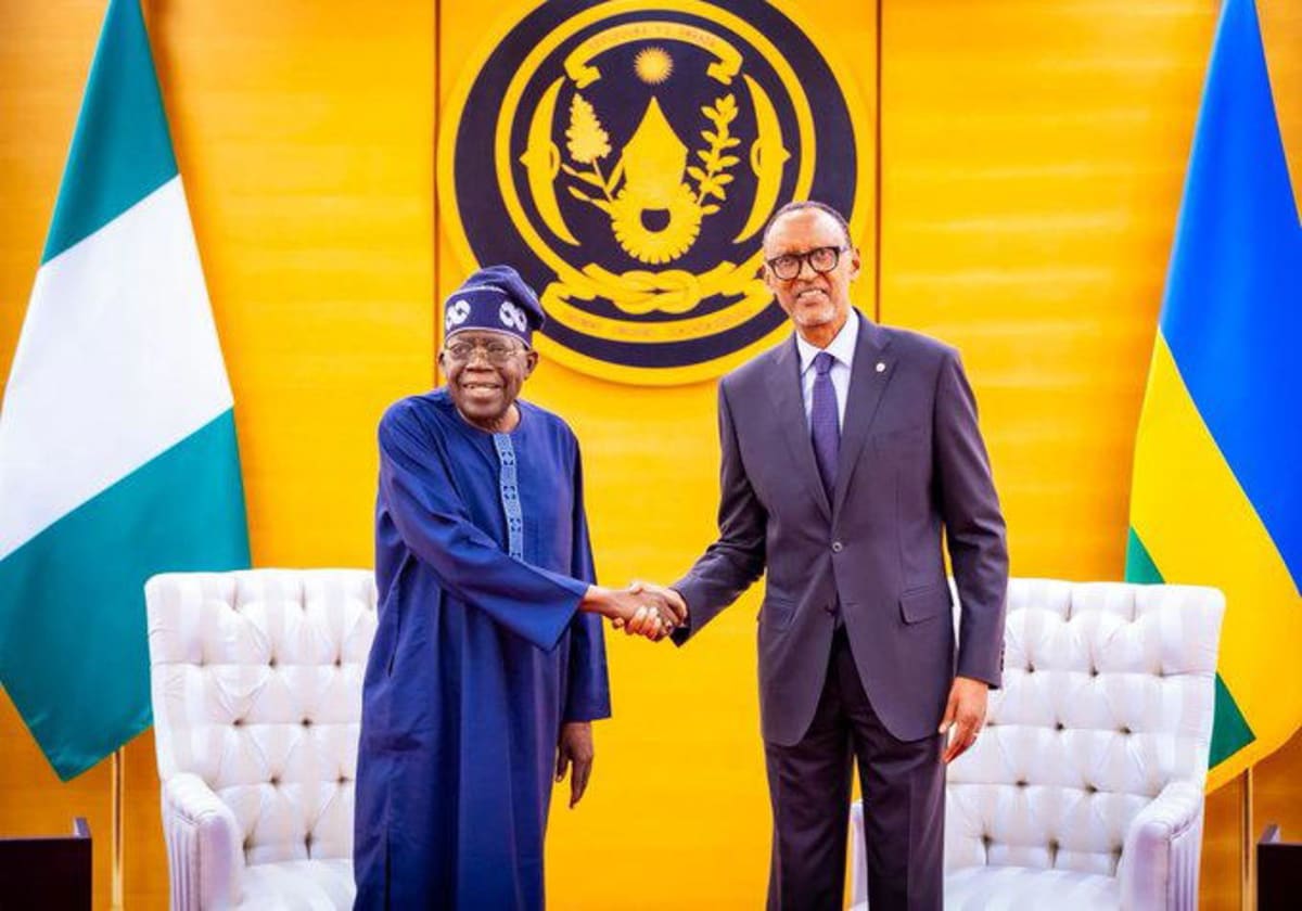 Nigerian President Bola Tinubu and Rwandan President Paul Kagame shaking hands at presidential meeting