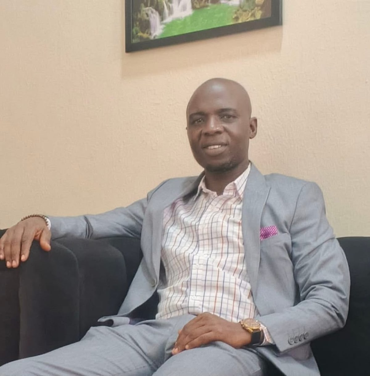 Academic leader in Nigeria celebrating promotion to Associate Professor at polytechnic campus