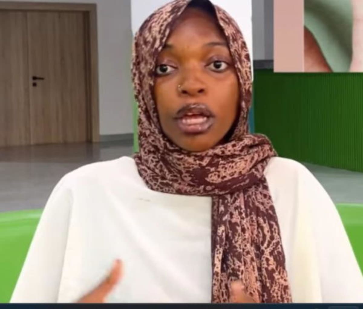 Young Nigerian woman sharing her story about living with adermatoglyphia online
