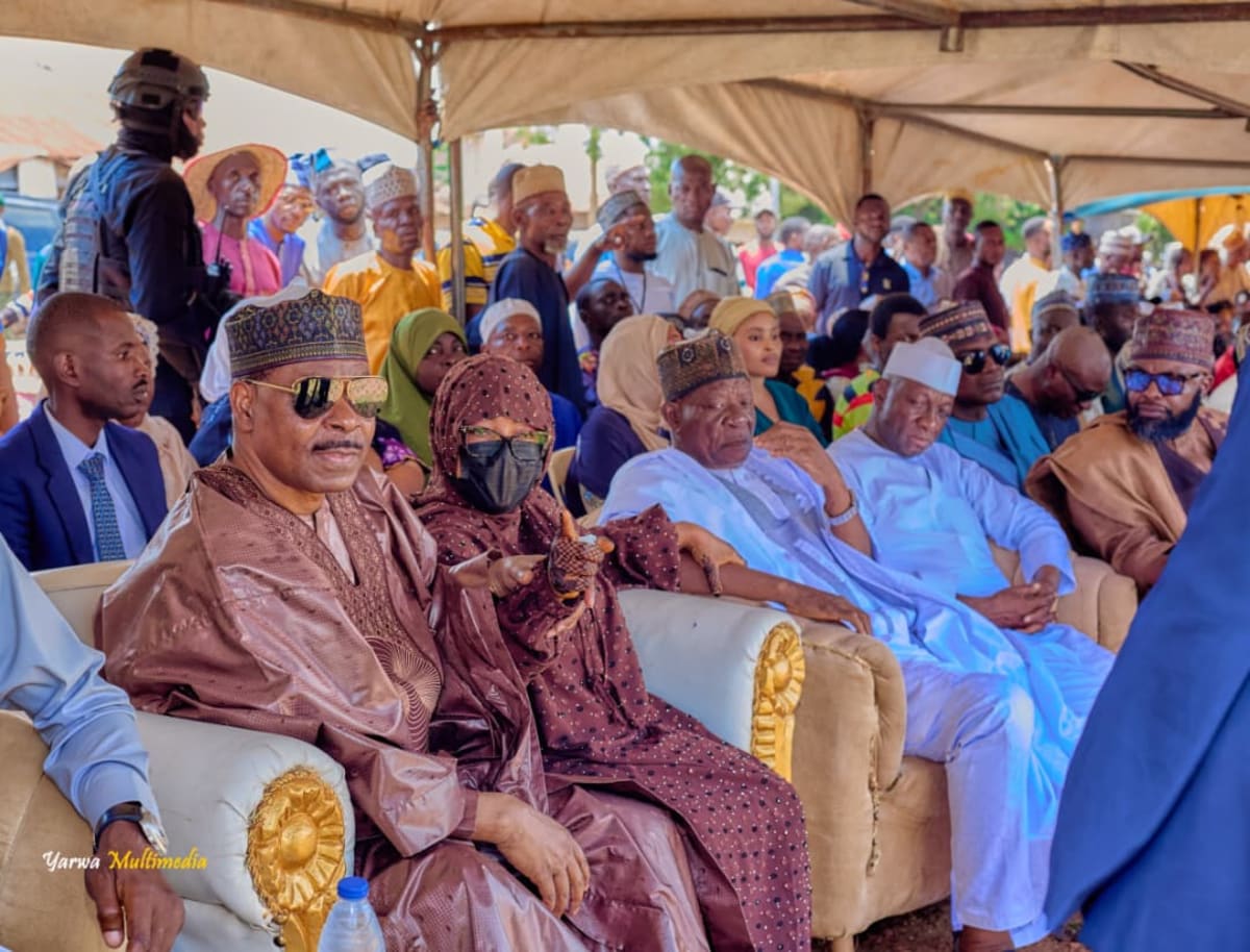 Nigerian farmers receiving modern agricultural equipment and supplies at community distribution event