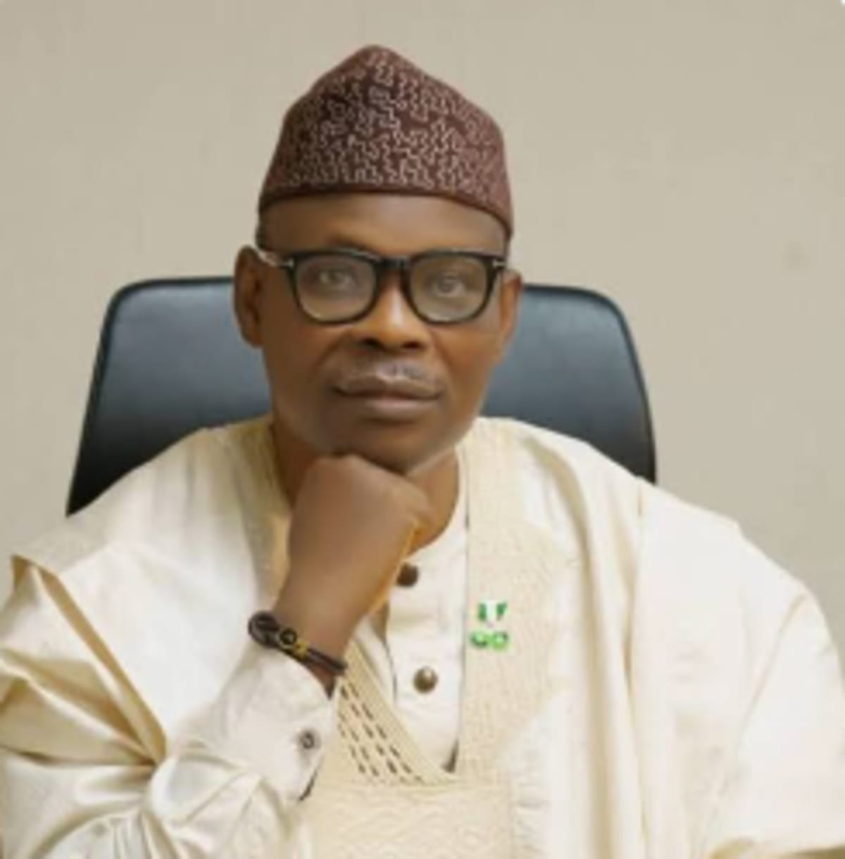 Nigerian healthcare worker providing prenatal care to pregnant woman in medical facility